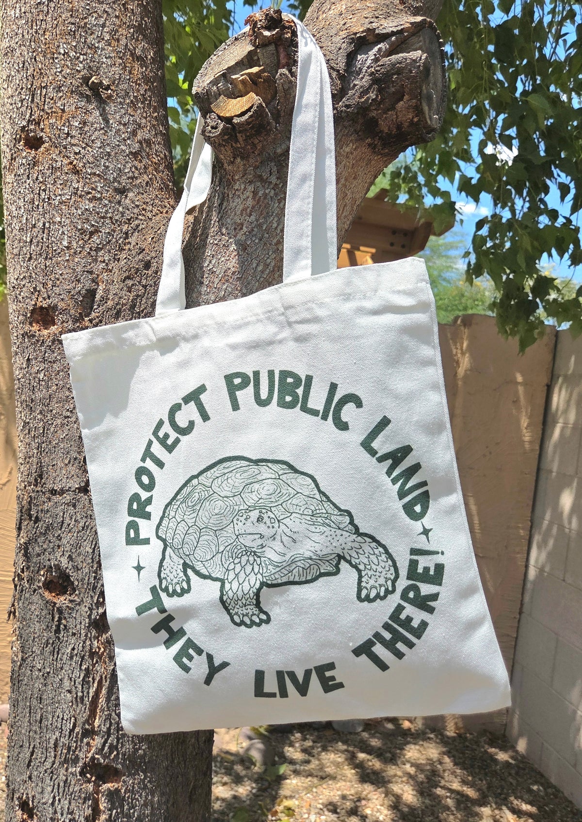 "Protect Public Land, They Live There!" Canvas Tote Bag